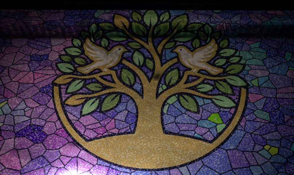 Stained-glass tree of life at One Soul Sanctuary